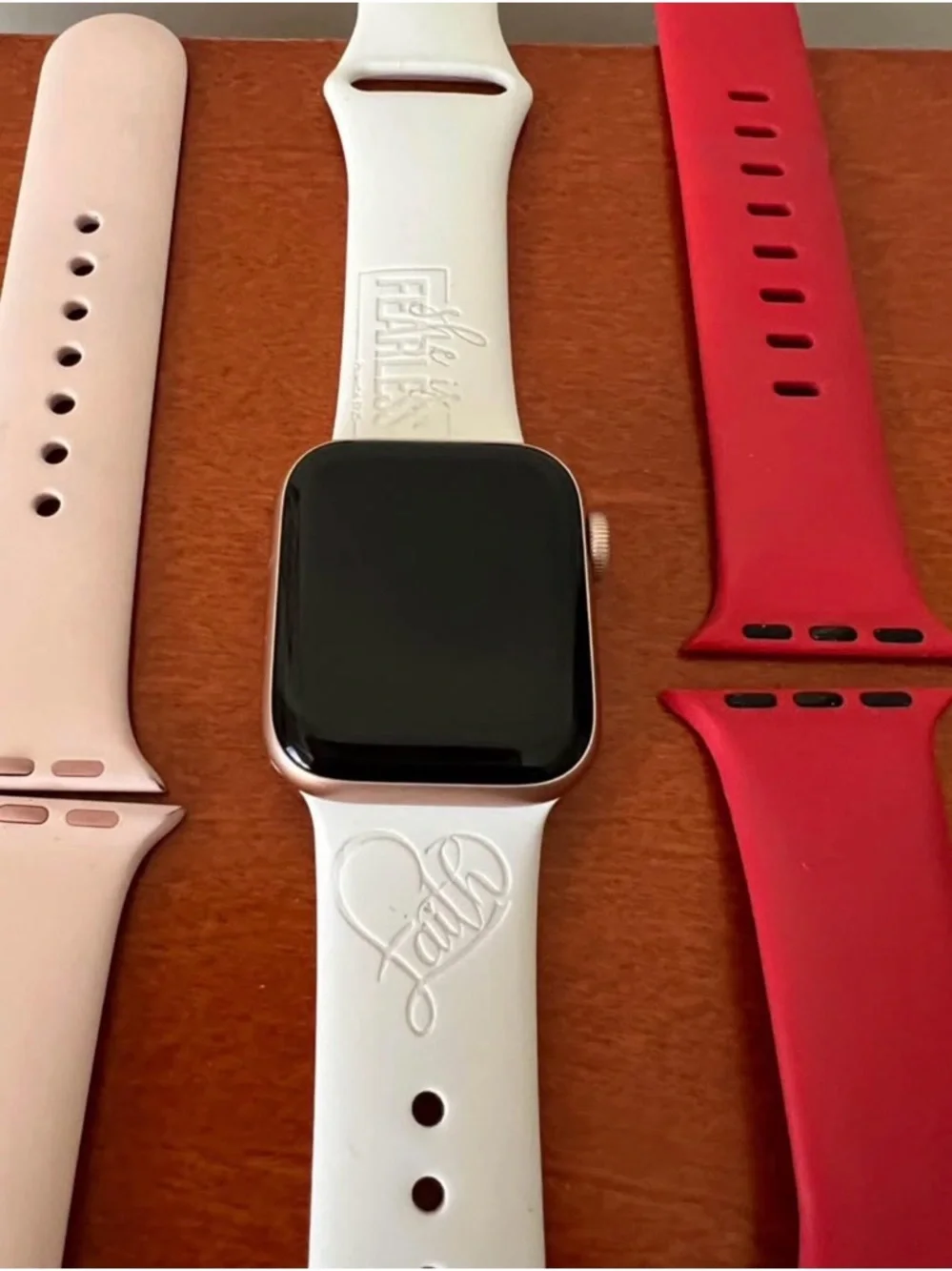 Apple Watch Rose Gold Case with White Sport Band and Red & Pink Extra Bands